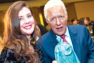 Jeopardy host Alex Trebek and his wife, Jean, pose after receiving Fordham University’s Founders’ Award at a Jan. 7 reception in Los Angeles.