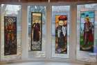 The stained glass panels at Frassati House in Kingston, Ont. — depicting, from left, Blessed Pier Giorgio Frassati, St. Oscar Romero, St. Maximilian Kolbe and Blessed Karl of Austria — were produced by Joseph Aigner of Artistic Glass in Toronto and commissioned by Fr. Raymond J. de Souza.