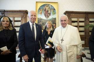 U.S. President Joe Biden, accompanied by his wife, Jill, is pictured with Pope Francis during a meeting at the Vatican Oct. 29, 2021. The pontiff and Biden spoke by phone Oct. 22, 2023, to discuss the ongoing conflict in Israel and Gaza and facilitating a path to &quot;durable peace&quot; in the region.