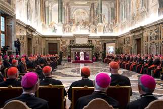 Pope Francis speaks during his annual pre-Christmas meeting with top officials of the Roman Curia and Vatican City State and with cardinals living in Rome in the Clementine Hall Dec. 21 at the Vatican. 