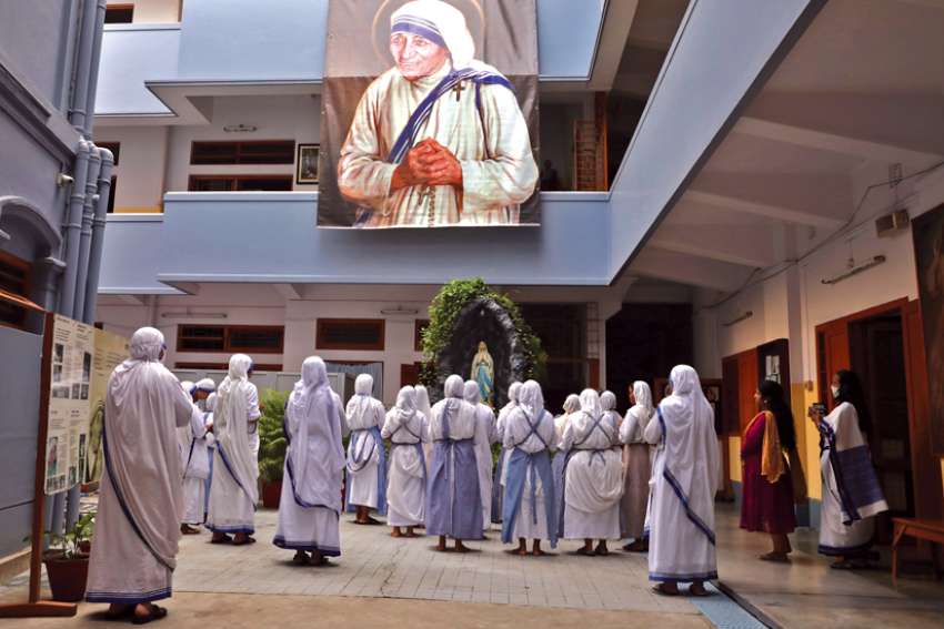Members of the Missionaries of Charity pray in Kolkata, India, Aug. 26, 2021. The order’s renewal application under the Foreign Contribution Regulation Act was at first not approved, which meant the nuns in India may not use any foreign currency account. The Indian government changed its stance Jan. 7.