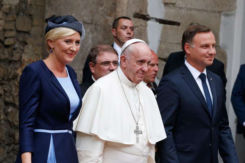 Pope Francis, Polish President Andrzej Duda and first lady Agata Kornhauser-Duda arrive for a meeting with government authorities and the diplomatic corps in the courtyard of Wawel Royal Castle in Krakow, Poland, July 27.