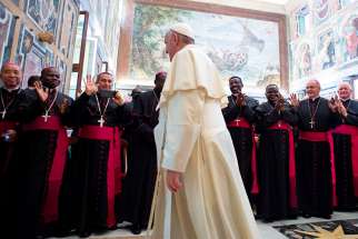  Pope Francis attends a meeting with new bishops from mission territories at the Vatican Sept. 8. The pope told them that the church needs bishops who promote unity, not &quot;soloists singing their own tune or captains fighting personal battles.&quot;