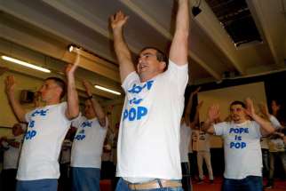Prisoners at the Ferrara District Prison practice for the “Pope is Pop” flash mob routine in Ferrara in northern Italy.