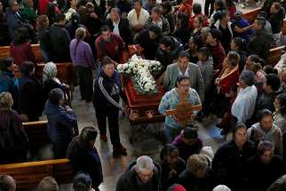 The casket of Cesar Jimenez Brito, 40, who was killed during a pipeline explosion, is carried during his Jan. 20, 2019, funeral at a Catholic church in Tlahuelilpan, Mexico. The nation&#039;s bishops offered prayers for the victims of the Jan. 18 explosion, in which dozens of villagers in the central state of Hidalgo perished after rushing to get some of the gasoline gushing from what appears to have been an illegally tapped pipeline.