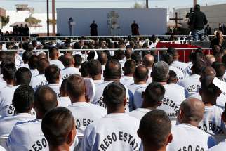 Prisoners attend a meeting with Pope Francis at Cereso prison in Ciudad Juarez, Mexico, Feb. 17, 2016