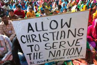 Christians are pictured in a file photo taking part in a protest in Chandigarh, India, against the killings of Christians in Orissa and Karnataka states. Prominent Indian citizens, including Christians, have demanded a repeal of all anti-conversion laws in the country, saying they are used to target minorities.