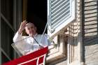 Pope Francis greets the crowd as he leads the Angelus from the window of his studio overlooking St. Peter&#039;s Square at the Vatican Nov. 8, 2020. The pope said people sometimes forget that life&#039;s ultimate purpose is preparing for the kingdom of heaven.