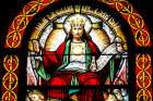 A stained-glass window depicting &quot;Christ the King and Lord of the Universe&quot; is seen in the Cathedral of St. Peter in Wilmington, Del..