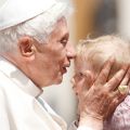 Pope Benedict XVI kisses a child as he leaves his general audience in St. Peter&#039;s Square at the Vatican May 2. 