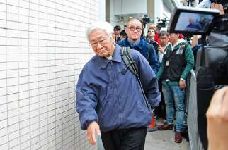 Cardinal Joseph Zen Ze-kiun leaves the police station after surrendering to police Dec. 3, 2014. The Chinese government has ordered mainland journalists not to describe Cardinal Zen as the &quot;emeritus&quot; bishop of Hong Kong, but to instead use the word &quot;former.&quot;