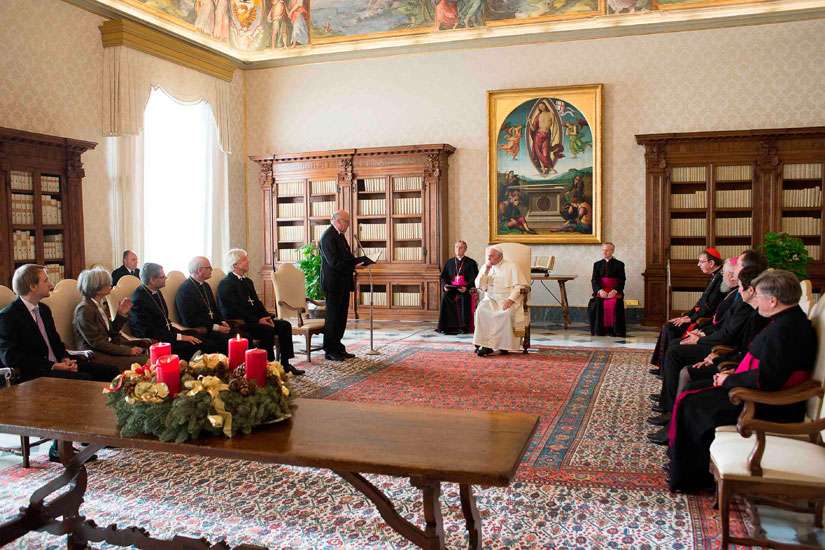 Pope Francis attends a special audience with members of the German Evangelical-Lutheran Church at the Vatican Dec. 18.
