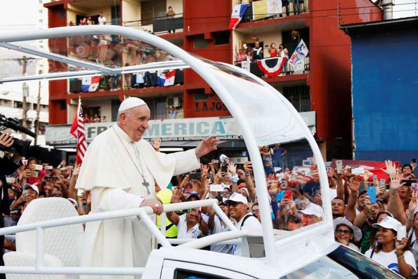 Pope Francis waves from his popemobile as he arrives for World Youth Day in Panama City Jan. 23, 2019. 