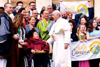 Setsuko Thurlow, in the wheelchair, meets with Pope Francis in St. Peter’s Square in March 2018 with members of the Earth Caravan. A few months earlier Thurlow had accepted the Nobel Peace Prize on behalf of the International Campaign to Abolish Nuclear Weapons.