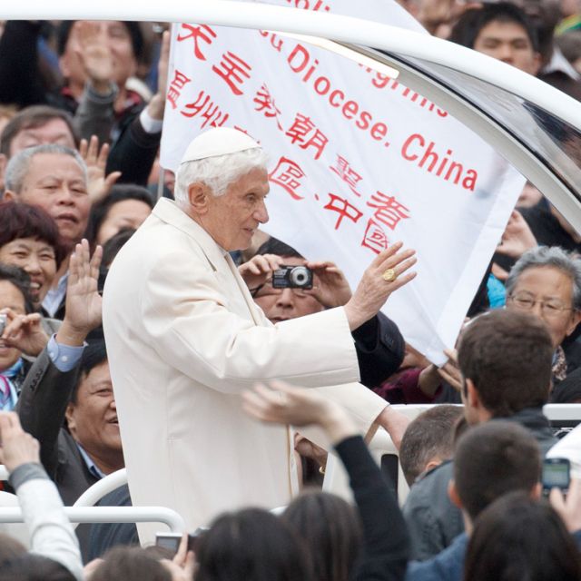 A banner from a diocese in China is seen as Pope Benedict XVI arrives to lead his general audience in St. Peter&#039;s Square at the Vatican April 11.