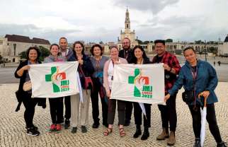 Isabel Correa, fifth from left, was among coordinators from around the world in Lisbon last month for preparation meetings for World Youth Day 2023, which will be held in August in the Portuguese city.