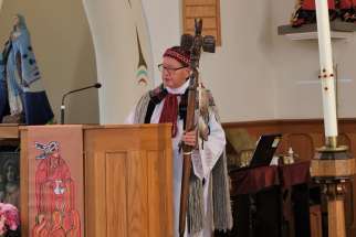 Deacon Rennie Nahanee holds a traditional Squamish speaking stick with a carved eagle representing a messenger during a presentation at St. Paul&#039;s Indian Church in North Vancouver, British Columbia, April 24, 2022. The parish is making a serious effort to integrate the faith with Squamish traditions and symbols.