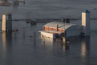 The flooded facility of the Camp Ashland Army National Guard in Ashland, Neb., is seen in this aerial photo March 17, 2019. Nebraska Gov. Pete Ricketts and the state&#039;s National Guard surveyed flooded farms, homes, bridges and highways, damage Ricketts called &quot;devastating&quot; and perhaps the worst in a half-century. At least three people have been reported killed. 