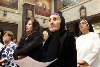 Iraqi Christians pray at the Church of our Lady of Perpetual Help during an interfaith service in Ainkawa in 2016. Iraqi Christians of various communities gathered with their church leaders to offer a prayer of support to Iraqi forces in the fight against the Islamic State.