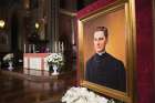 A portrait of of Blessed Michael McGivney, founder of the Knights of Columbus, is displayed during a prayer vigil at St. Mary’s Church in New Haven, Conn., Oct. 30, 2020, the eve of his beatification.