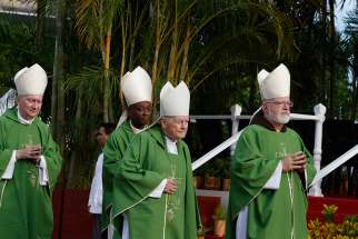 Cardinals arrive for Mass celebrated by Pope Francis in Revolution Square in Havana Sept. 20. Pictured from left are Cardinals Pietro Parolin, Vatican secretary of state; Chibly Langlois of Les Cayes, Haiti; Theodore E. McCarrick, retired archbishop of Washington; and Sean P. O&#039;Malley of Boston.