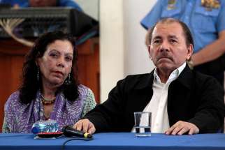 Nicaraguan President Daniel Ortega and his wife, Vice President Rosario Murillo, attend a church-mediated dialogue session in Managua May 16. 