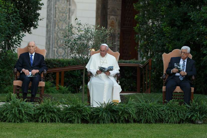 Israeli President Shimon Peres, Pope Francis and Palestinian President Mahmoud Abbas attend an invocation for peace in the Vatican Gardens June 8, 2014.
