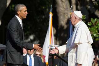 U.S. President Barack Obama shakes hands with Pope Francis during an arrival ceremony on the South Lawn of the White House in Washington Sept. 23.