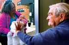 Ed Ecker, 95, meets his newborn great-grandson, Brayden Shantz, through a window at St. Joseph’s Lifecare Centre in Brantford, Ont.