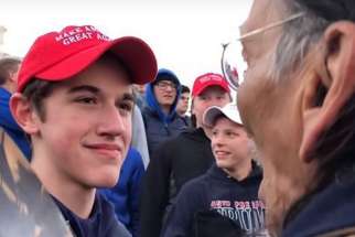 Nick Sandmann, a junior at Covington Catholic High School in Park Hills, Ky., and others students from the school stand in front of Native American &#039;Vietnam-times&#039; veteran Nathan Phillips Jan. 18 near the Lincoln Memorial in Washington in this still image from video. An exchange between the students and Phillips Jan. 18 was vilified on social media the following day, but the immediate accusations the students showed racist behaviour were stepped back as more details of the entire situation emerged.
