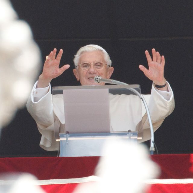 Pope Benedict XVI greets the crowd after praying the Angelus from the window of his apartment overlooking St. Peter&#039;s Square at the Vatican June 17. 