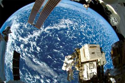 A NASA astronaut works outside the International Space Station in this image released Oct. 8, 2014. The universe’s beauty is only going to be more obvious with the James Webb Space Telescope.