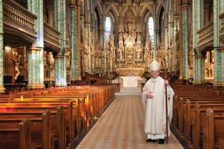 Archbishop Marcel Damphousse inside Ottawa’s Notre Dame Cathedral.