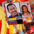 Images of Venezuelan President Hugo Chavez and Jesus are held up at a rally in Chavez&#039; honor outside Miraflores Palace in Caracas Jan. 10. Venezuela&#039;s Supreme Court allowed indefinite postponement of his inauguration, scheduled for Jan. 10, raising ques tions about political leadership in the country. Chavez has not spoken or appeared publicly since undergoing a fourth cancer operation in Havana Dec. 11.