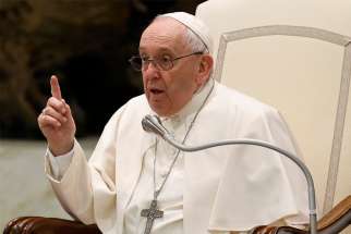 Pope Francis speaks during his general audience in the Paul VI hall at the Vatican Feb. 23, 2022.