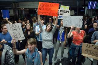 People gather for a protest at the Arrivals Hall of San Francisco&#039;s International Airport after people coming in from Muslim-majority countries were held Jan. 28 by border control as a result of the new executive memorandum by U.S. President Donald Trump.