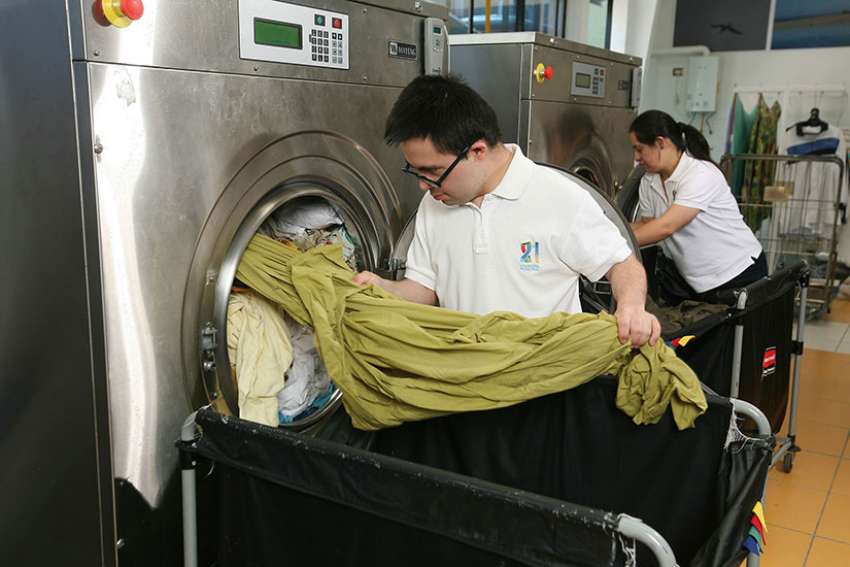 Opened in 2014, Lavandería 21 is a laundry service that employs workers with Down Syndrome.