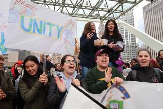 Students from St. Joseph&#039;s College School join high schoolers from across the Greater Toronto Area at a Nathan Phillips Square peace rally in Toronto Apr. 25, 2018. 