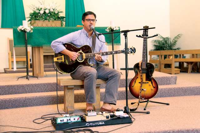 UBC assistant professor Samuel Rocha performing at St. Joseph the Worker Church in Vancouver. His new album reflects the impact Saint Augustine has had on his life.