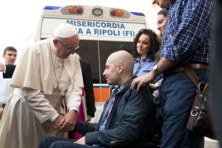 Pope Francis greets Giuseppe Chiolo, 16, in St. Peter&#039;s Square during a Year of Mercy general audience at the Vatican Sept. 10. The pope administered the sacrament of confirmation to the young man, who is being treated in the oncology ward of a Florence hospital.