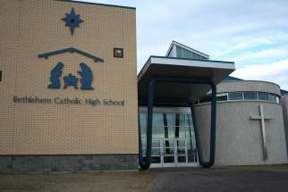 The exterior of Bethlehem Catholic High School is seen in an undated photo in Saskatoon, Saskatchewan. Premier Brad Wall said May 1 that he will invoke the notwithstanding clause in the Charter of Rights and Freedoms to block an April 21 ruling on Catholic school funding.