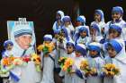 Girls dressed up as Blessed Mother Teresa during an Aug. 26 event to commemorate her 104th birth anniversary in a school in Bhopal, India. Mother Teresa was born Agnes Gonxha Bojaxhiu Aug. 26, 1910, to Albanian parents in Skopje, in present-day Macedonia . She died in 1997 and was beatified by Pope John Paul II in 2003. 
