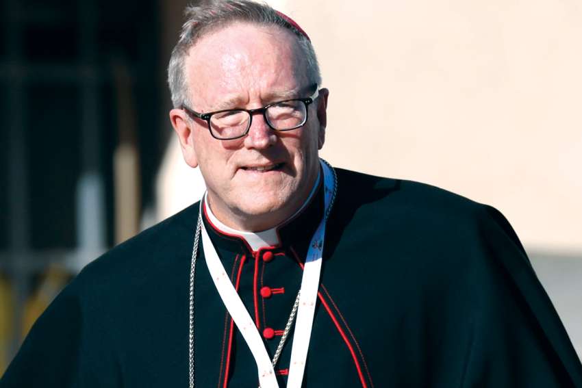 Bishop Robert E. Barron of Winona-Rochester, Minn., arrives for the first working session of the assembly of the Synod of Bishops at the Vatican Oct. 4.
