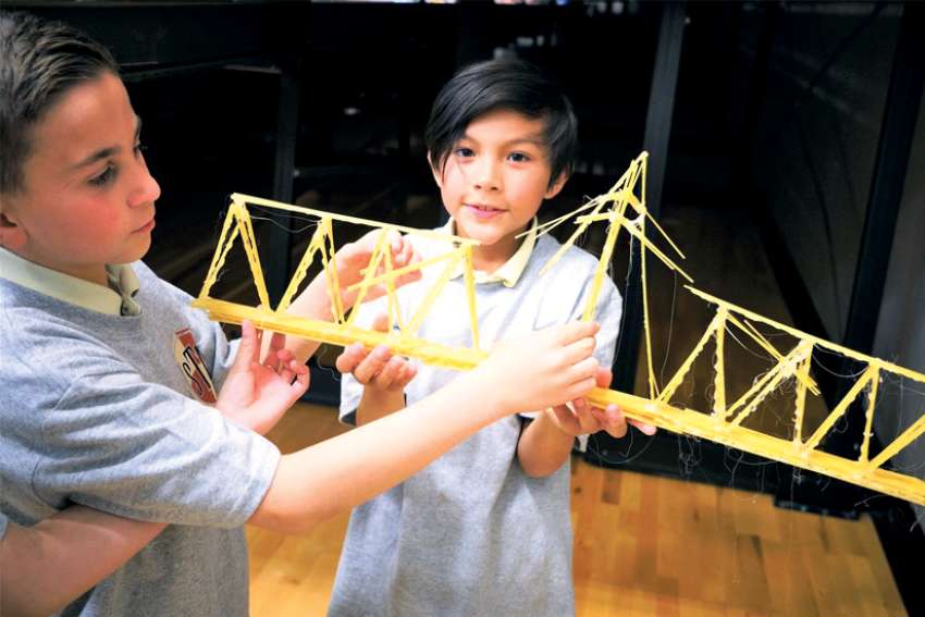 Students show what can be done with spaghetti and hot glue. North Vancouver’s St. Thomas Aquinas Secondary held a bridge-building contest to welcome elementary students to their future school community.