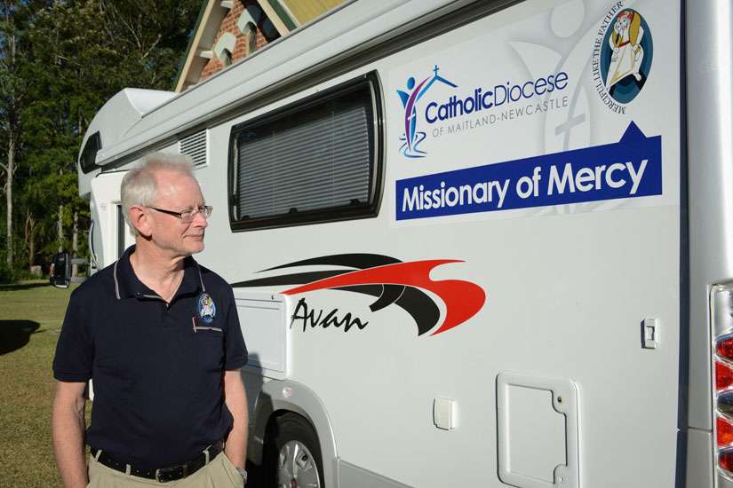 Jesuit Father Richard Shortall, a missionary of mercy for the Jubilee Year of Mercy, walks outside his motor home at St. Patrick and St. Brigid Church in Cooranbong, Australia, May 26. Father Shortall, one of two missionaries of mercy in Australia, is traveling throughout the Maitland-Newcastle Diocese to rural parishes that have no resident priest.