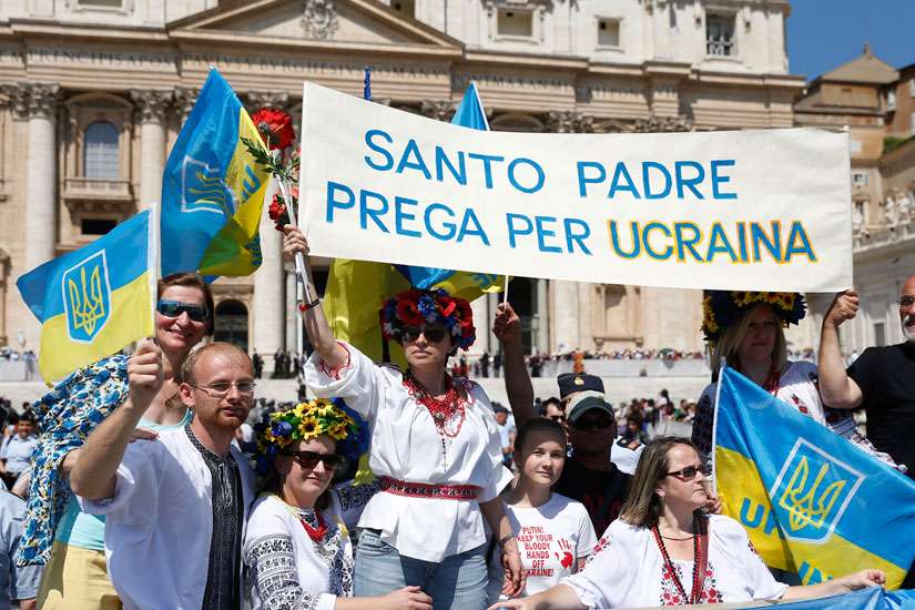 Ukrainian church leaders denounced plans to allow same-sex unions through reforms saying that the provisions will destroy the basic social institution of the family in a July 23 letter. In this photo, Ukrainians attend Pope Francis&#039; general audience in St. Peter&#039;s Square at the Vatican June 10. The sign in Italian says, &quot;Holy Father, Pray for Ukraine.&quot;