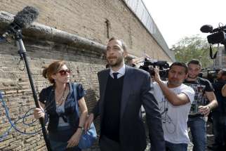 Journalist Emiliano Fittipaldi walks to his trial April 6 at the Vatican.