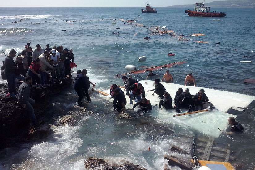 Migrants arrive at Zefyros beach near the coast of the southeastern island of Rhodes, Greece, April 20. At least three people drowned the day after Pope Francis appealed for the international community to do more to prevent such migrant deaths.