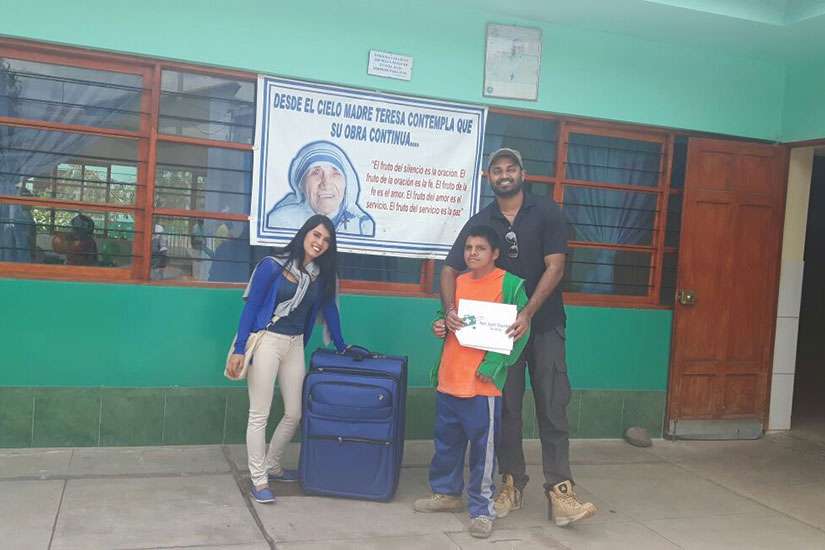 Avi D’Souza (right) recently brought a suitcase of medical supplies to a hospital run by the Missionaries of Charity Sisters in Peru. 