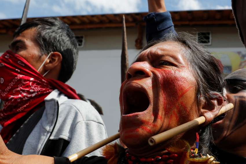 Indigenous people react during protests against Ecuadorian President Lenin Moreno&#039;s austerity measures in Quito, Ecuador, Oct.11, 2019. Ecuadorian observers at the Synod of Bishops for the Amazon at the Vatican are keeping an eye on massive protests that have claimed the lives of at least five people in their country.